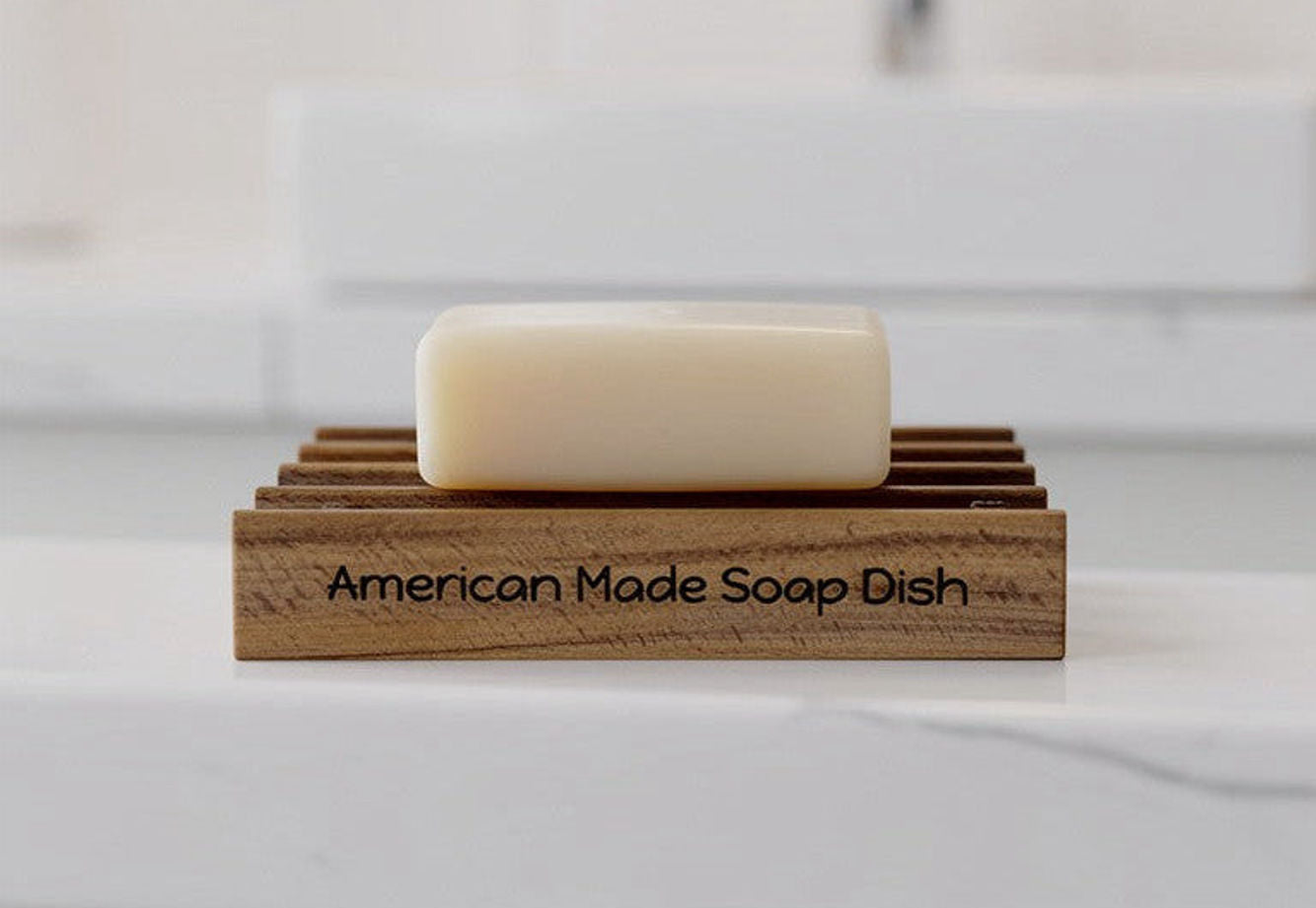 Wooden soap saver with a bar of soap and engraved American made soap dish